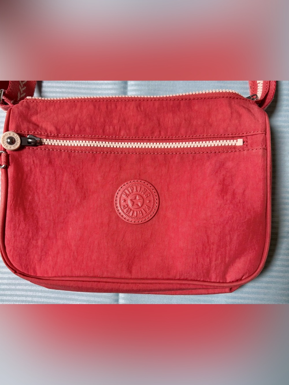 Kipling Coral-Red Front Zip Crossbody Bag
